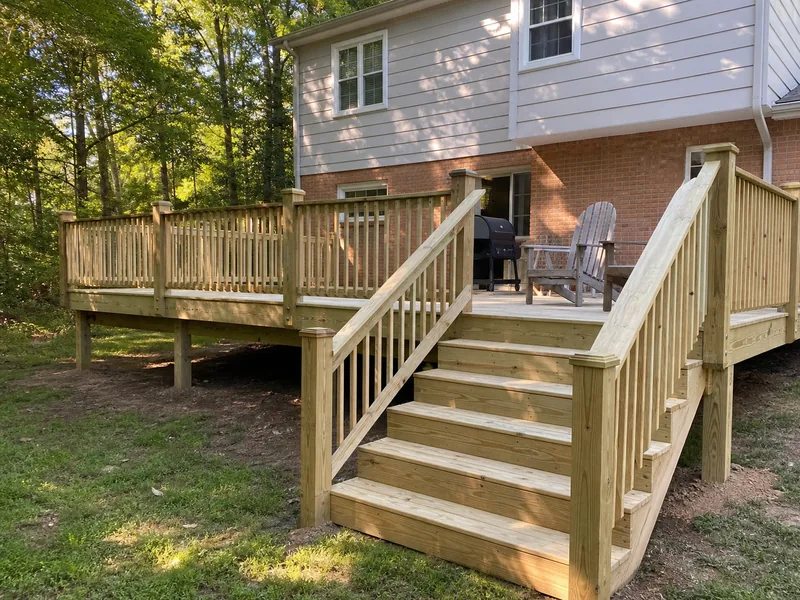 New pressure-treated wood deck and stairs
